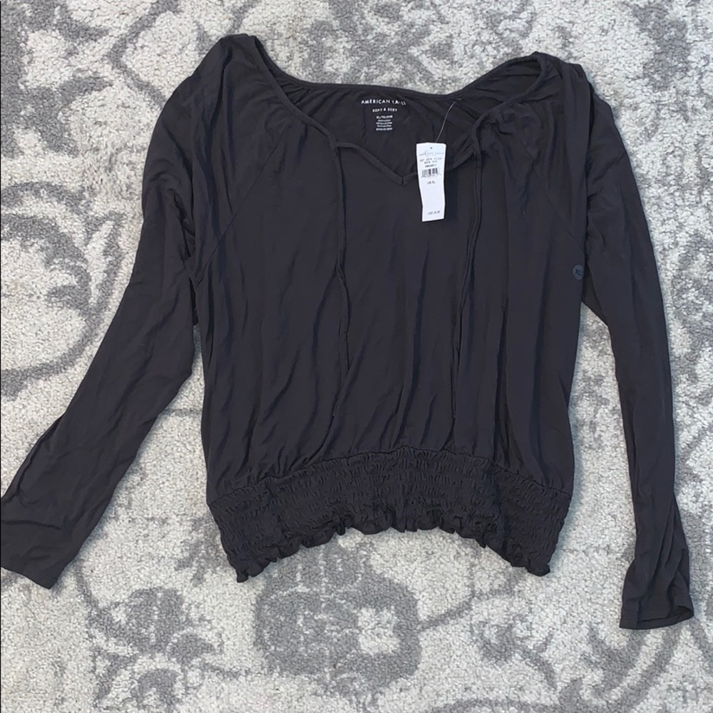 Long sleeve ruched bottom top